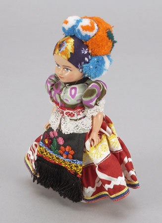 Small doll wearing a Hungarian costume. The clothing is in the style of the Matyó or Mezõkövesd areas of Hungary. It was bought in Budapest in 1976 and brought to Canada by its owner., © CMC/MCC, 77-11