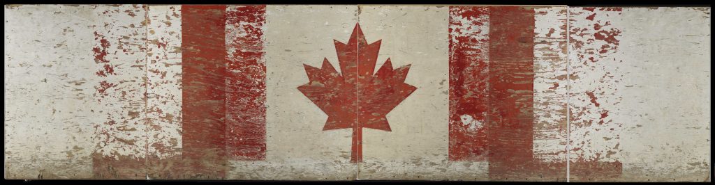 Un drapeau canadien peint sur un mur en bois à Ottawa, près du Musée canadien de la guerre.